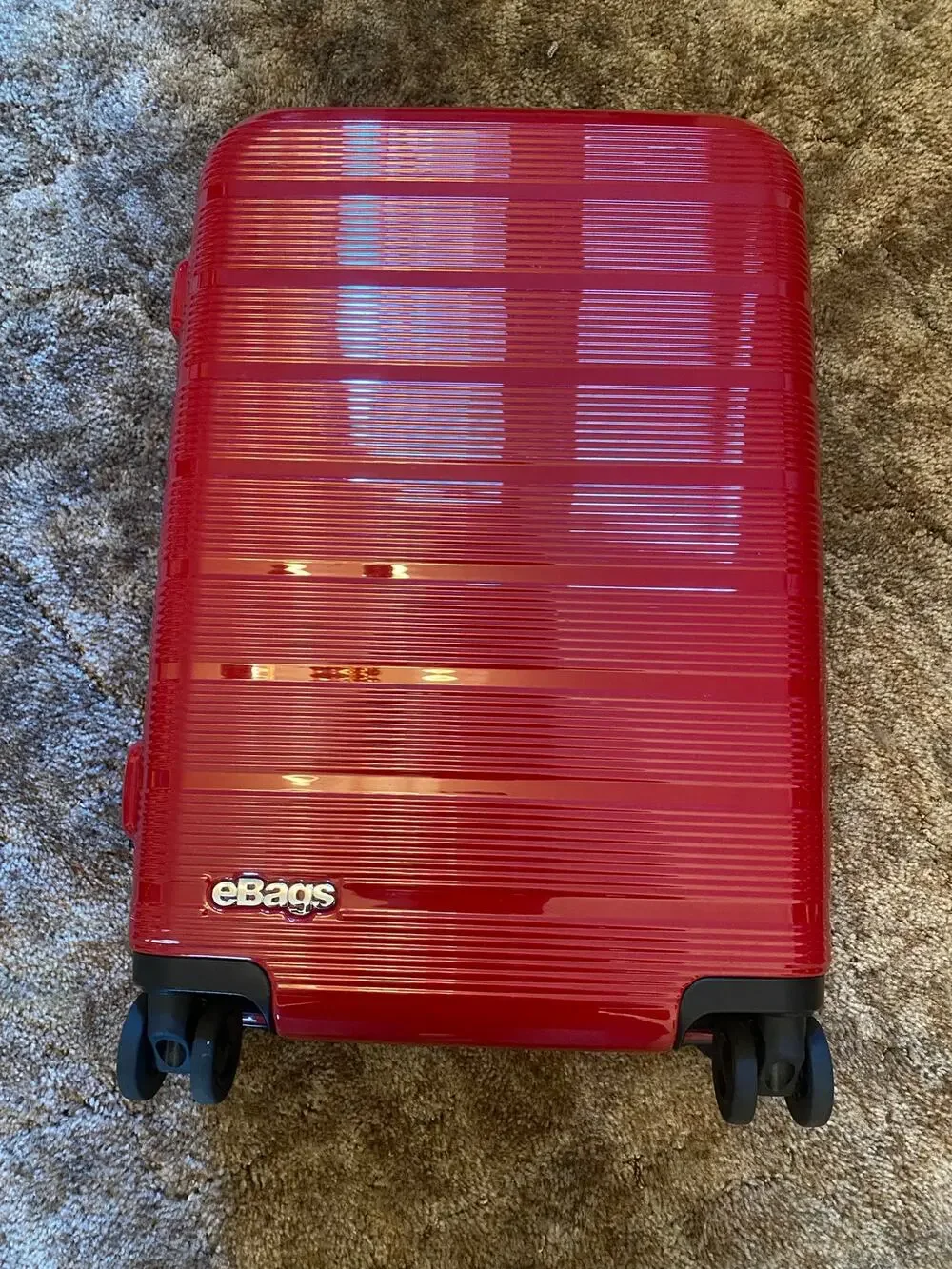 eBags Hard Shell Spinner Carry On Size Suit Case Luggage in Red Ribbed 22